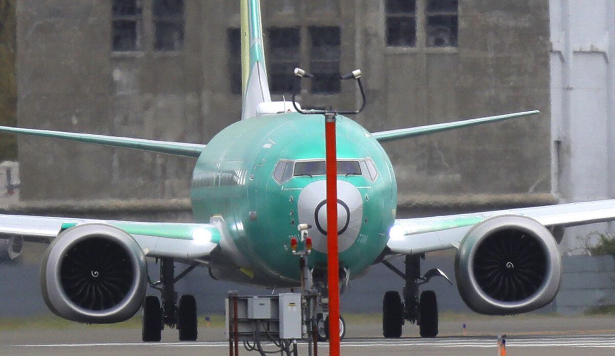 A Boeing 737 Max 8 being built for Spain-based Air Europa turns before taking off on a test flight at Boeing Field in Seattle.