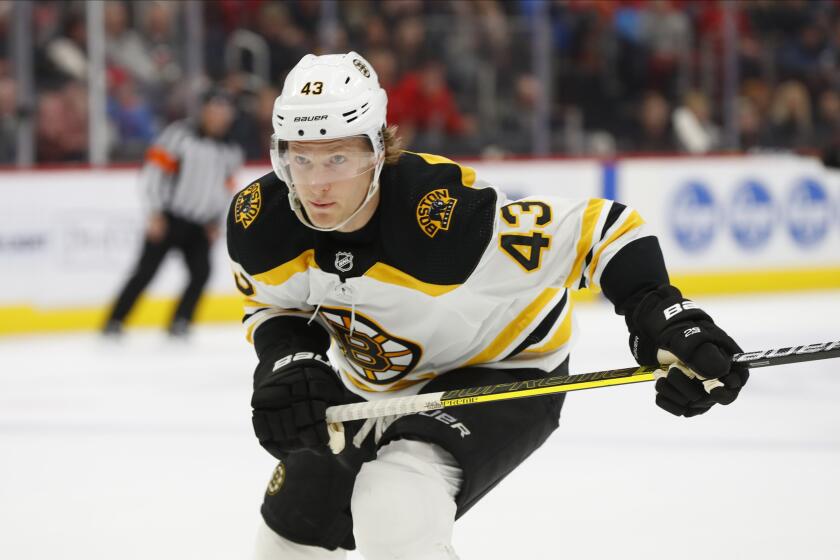 Boston Bruins center Danton Heinen (43) plays against the Detroit Red Wings in the first period of an NHL hockey game Sunday, Feb. 9, 2020, in Detroit. (AP Photo/Paul Sancya)