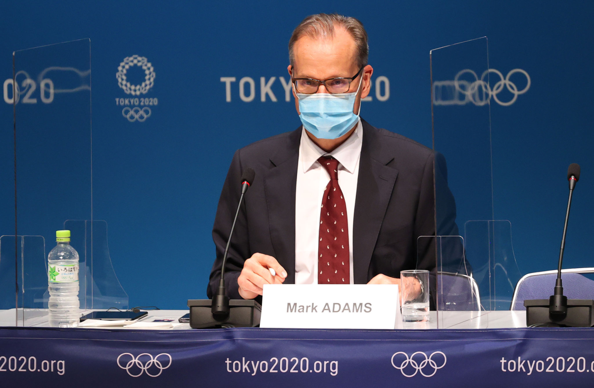 Mark Adams speaks at a news conference about the Tokyo Olympics.