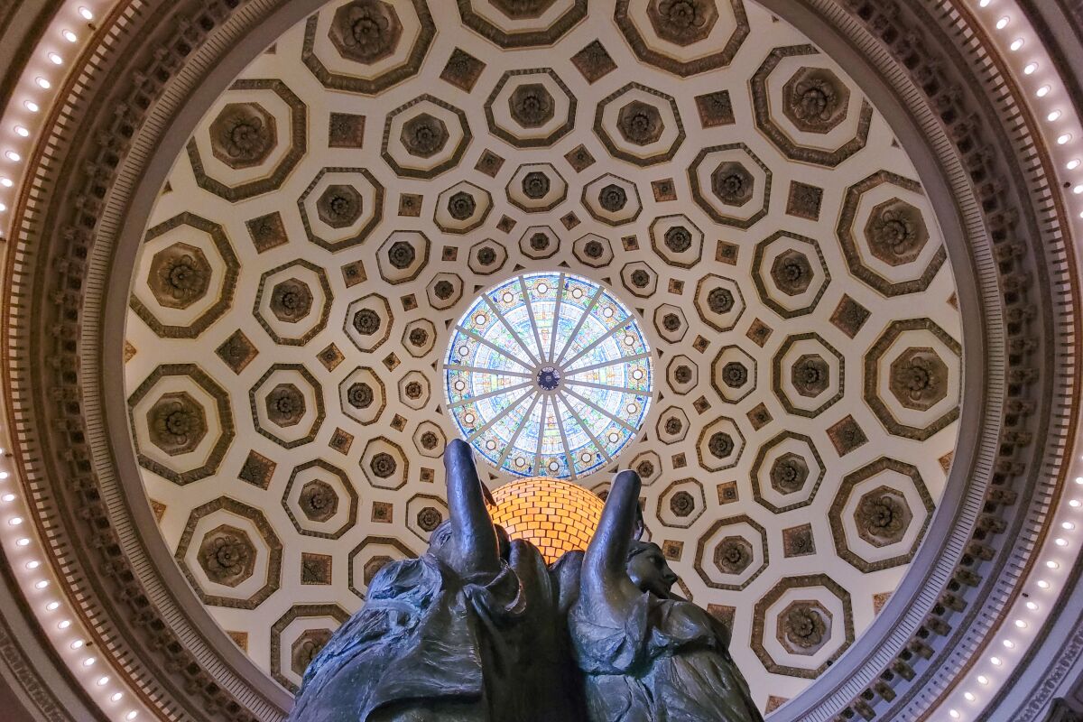 A coffered rotunda capped by a skylight.