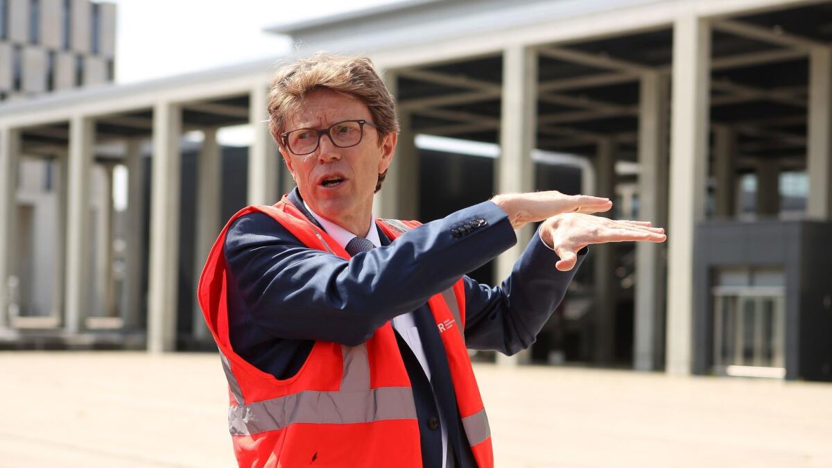 Engelbert Luetke Daldrup, head of the construction project for a new Berlin airport, speaks during a press visit to the unopened facility.