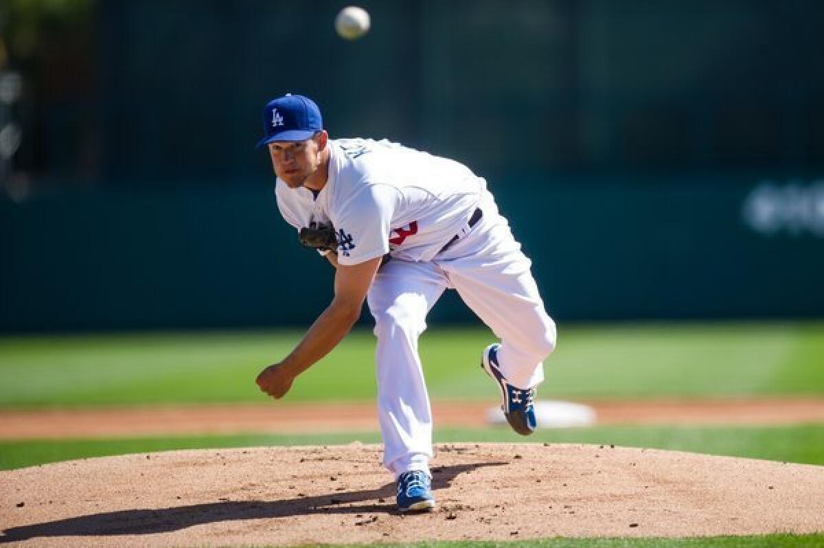 Ace Clayton Kershaw was charged with two runs and four hits in two innings during the Dodgers' spring training opener, a 9-0 loss to the Chicago White Sox.