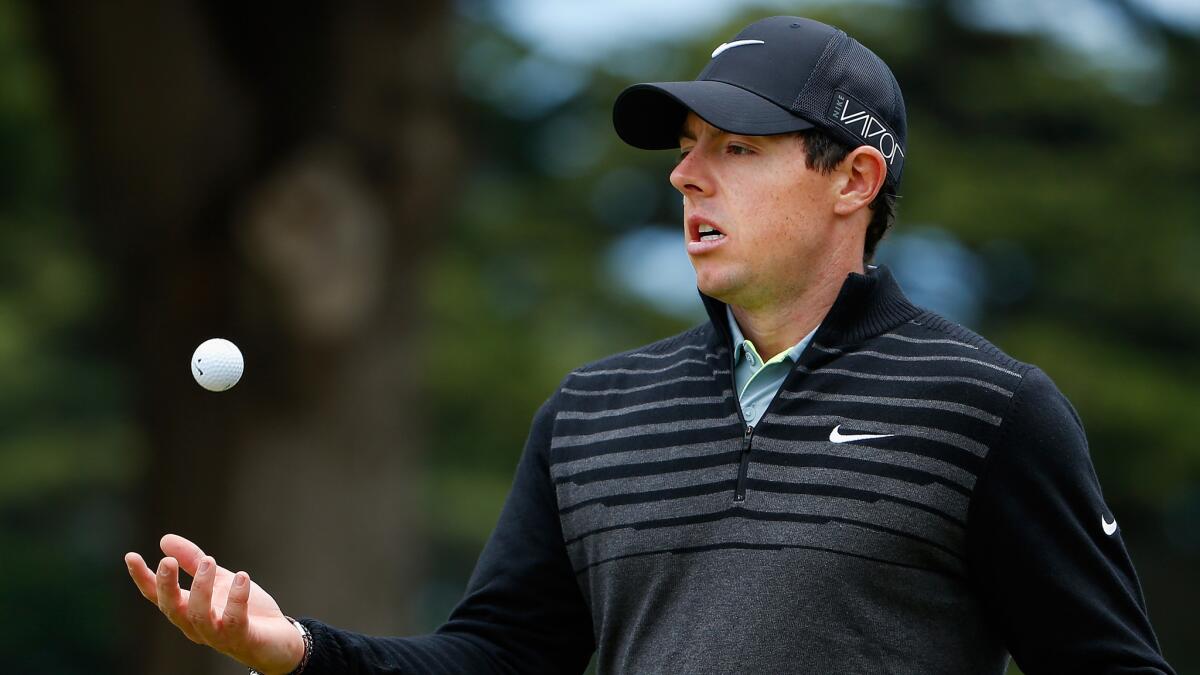 Rory McIlroy tosses his golf ball after missing a putt on the eighth green during the Match Play Championship in San Francisco on Sunday.