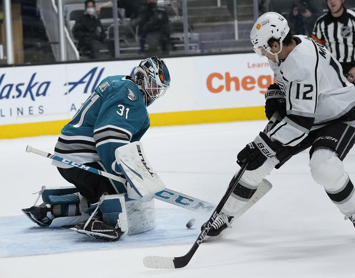Sharks goalie Martin Jones blocks a shot by the Kings' Trevor Moore during the second period April 9, 2021.