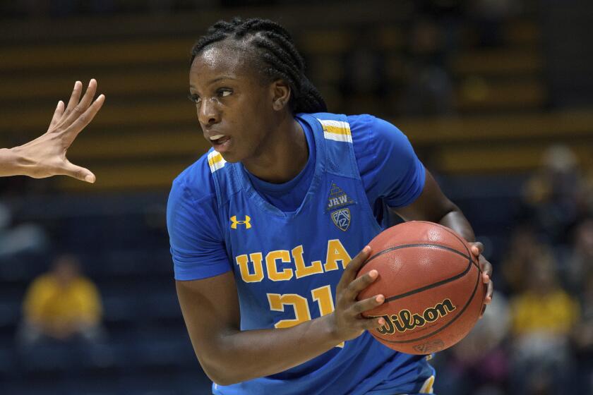 UCLA's Michaela Onyenwere looks to pass during an NCAA college basketball game against Cal, at Haas Pavilion on Friday, Jan. 4, 2019, in Berkeley, Calif. (AP Photo/Tomas Ovalle)