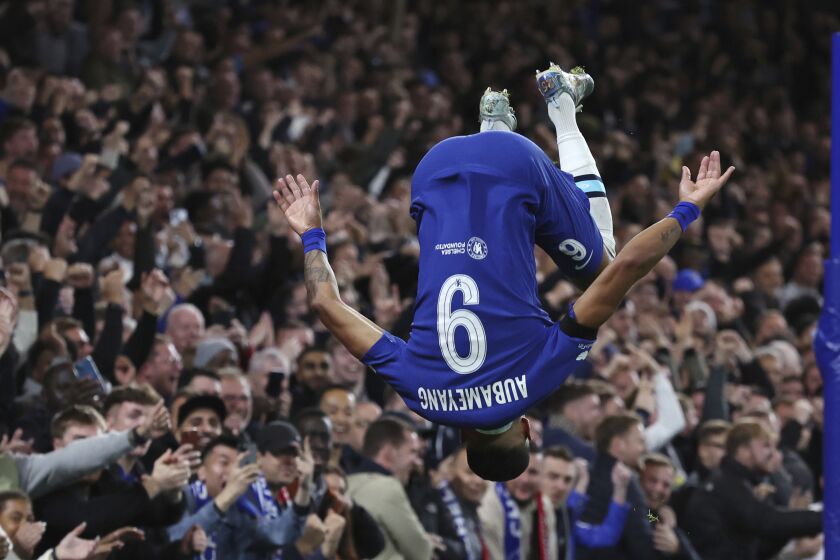 Chelsea's Pierre-Emerick Aubameyang celebrates after scoring his side's second goal during a Group E soccer match between Chelsea FC and AC Milan, at Stamford Bridge stadium, in London Wednesday, Oct. 5, 2022. (AP Photo/Ian Walton)