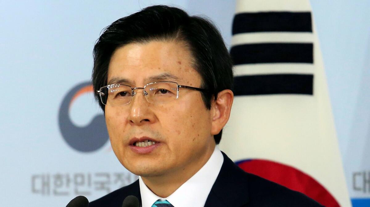 South Korean acting leader Hwang Kyo-ahn speaks during a news conference in Seoul on Jan. 23.