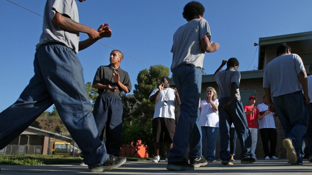 Juvenile students at Camp Afflerbaugh in La Verne in 2013. L.A. County supervisors are weighing whether to ban the use of pepper spray at such facilities.