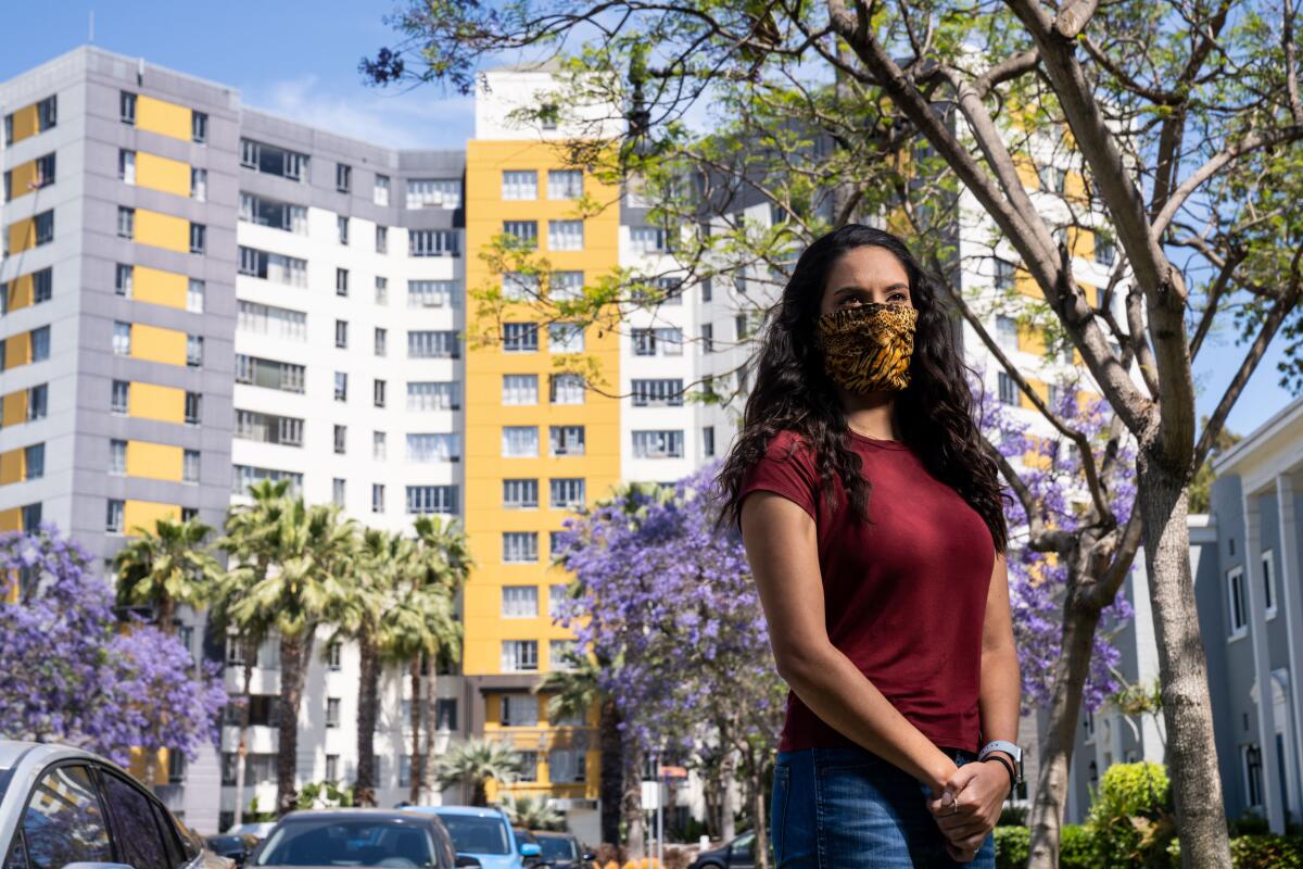 Sabrina Knight, 26, is worried about the spread of the novel coronavirus within Park La Brea but she's happy living there.