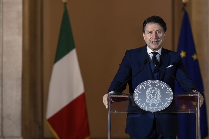Italian Prime Minister Giuseppe Conte speaks at a press conference on the reopening after the lockdown due to the coronavirus pandemic, Saturday, May 16, 2020, in Rome, Italy. (LaPresse via AP, Pool)