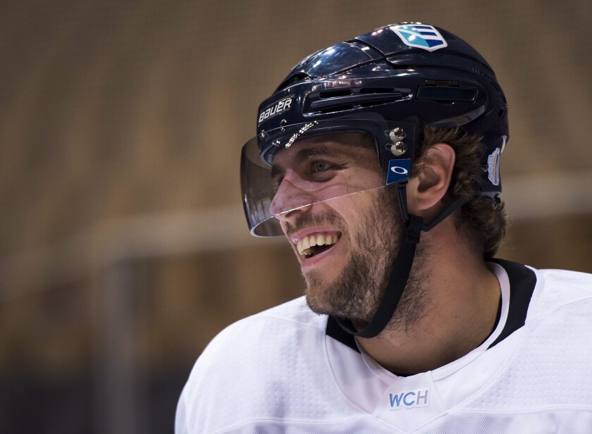 Team Europe captain Anze Kopitar (11) laughs at a practice on Sept. 26 ahead of the World Cup of Hockey finals in Toronto.