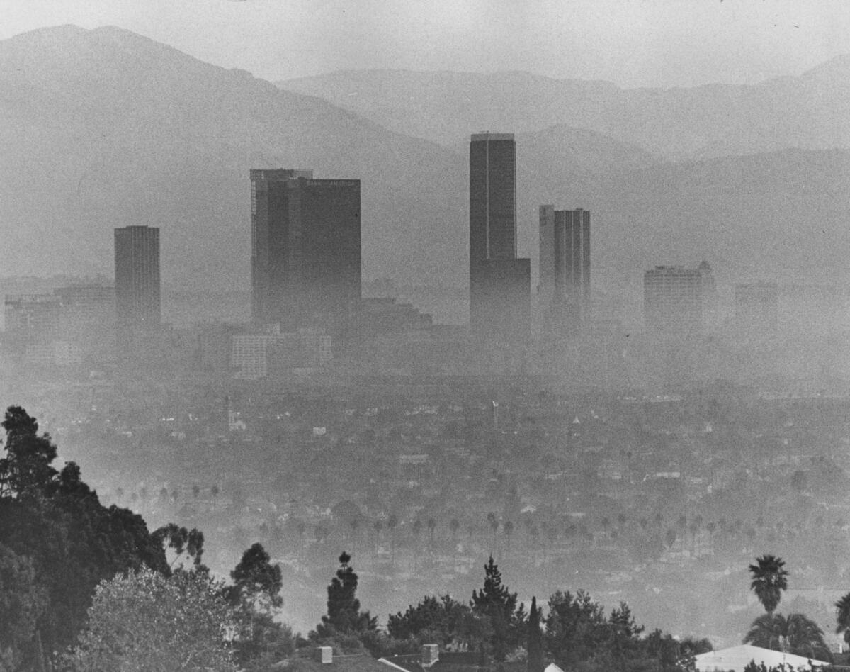 Downtown Los Angeles' tallest buildings rise above a blanket of smog in October 1973. (Fitzgerald Whitney / Los Angeles Times)