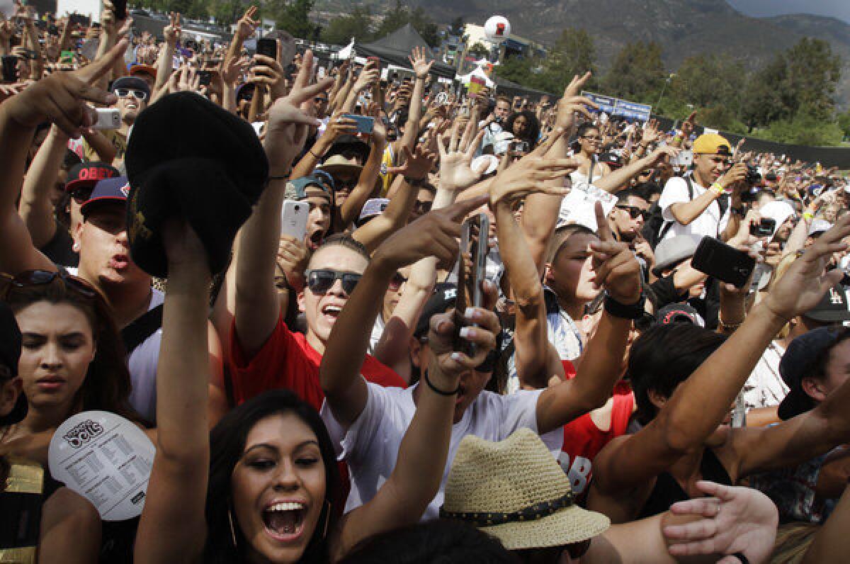 Fans cheer on performers on Day 1 of Rock the Bells at San Manuel Amphitheater in San Bernardino on Sep. 7, 2013.