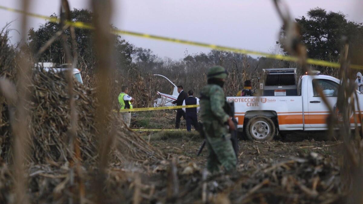 Authorities on Monday investigate the crash site where Gov. Martha Erika Alonso and her husband, ex-Gov. Rafael Moreno Valle, were killed in Puebla state.