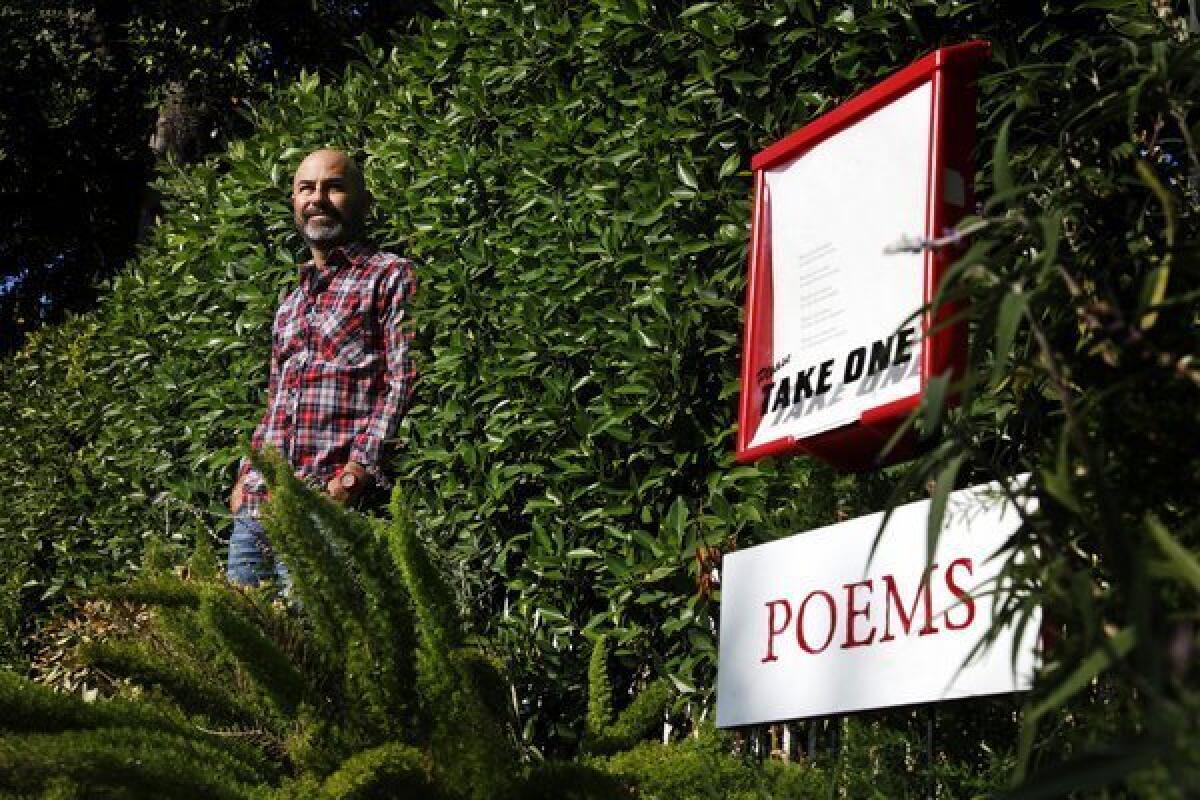 Silver Lake resident Peleg Top stands by the Moreno Drive poetry box that has won so many fans.