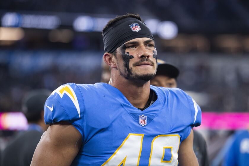 Los Angeles Chargers linebacker Drue Tranquill (49) walks off the field before an NFL football game against the Las Vegas Raiders Monday, Oct. 4, 2021, in Inglewood, Calif. (AP Photo/Kyusung Gong)