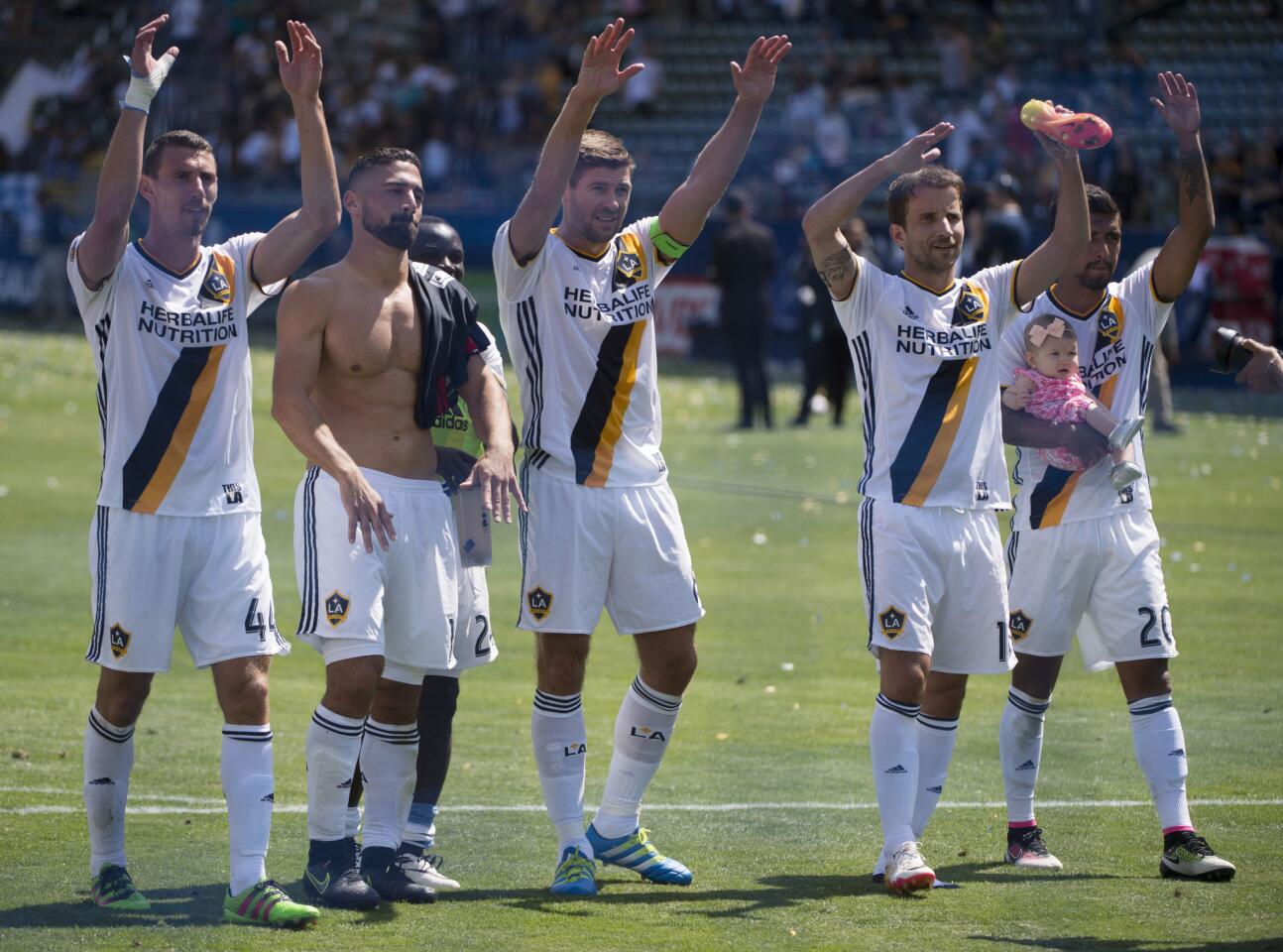 May 8, 2016; Carson, CA, USA; LA Galaxy players celebrate with fans in the stands after defeating the New England Revolution 4-2 at StubHub Center. Mandatory Credit: Kelvin Kuo-USA TODAY Sports ** Usable by SD ONLY **