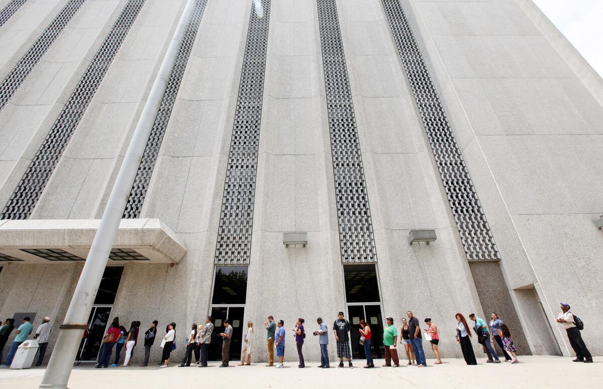 Lines outside of traffic courts in Los Angeles, such as this one, are expected to grow longer following a new wave of cuts within the Los Angeles County court system.