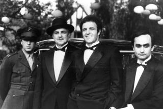A black and white image of three men in tuxedos and a fourth man in uniform