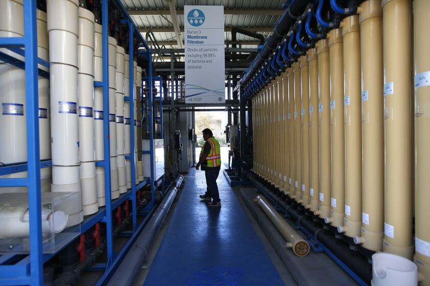 David Mills, Sr. Plant Tech Supervisor walks through the membrane filtration columns at the Pure Water Demonstration Facility in San Diego on Nov. 5, 2019.