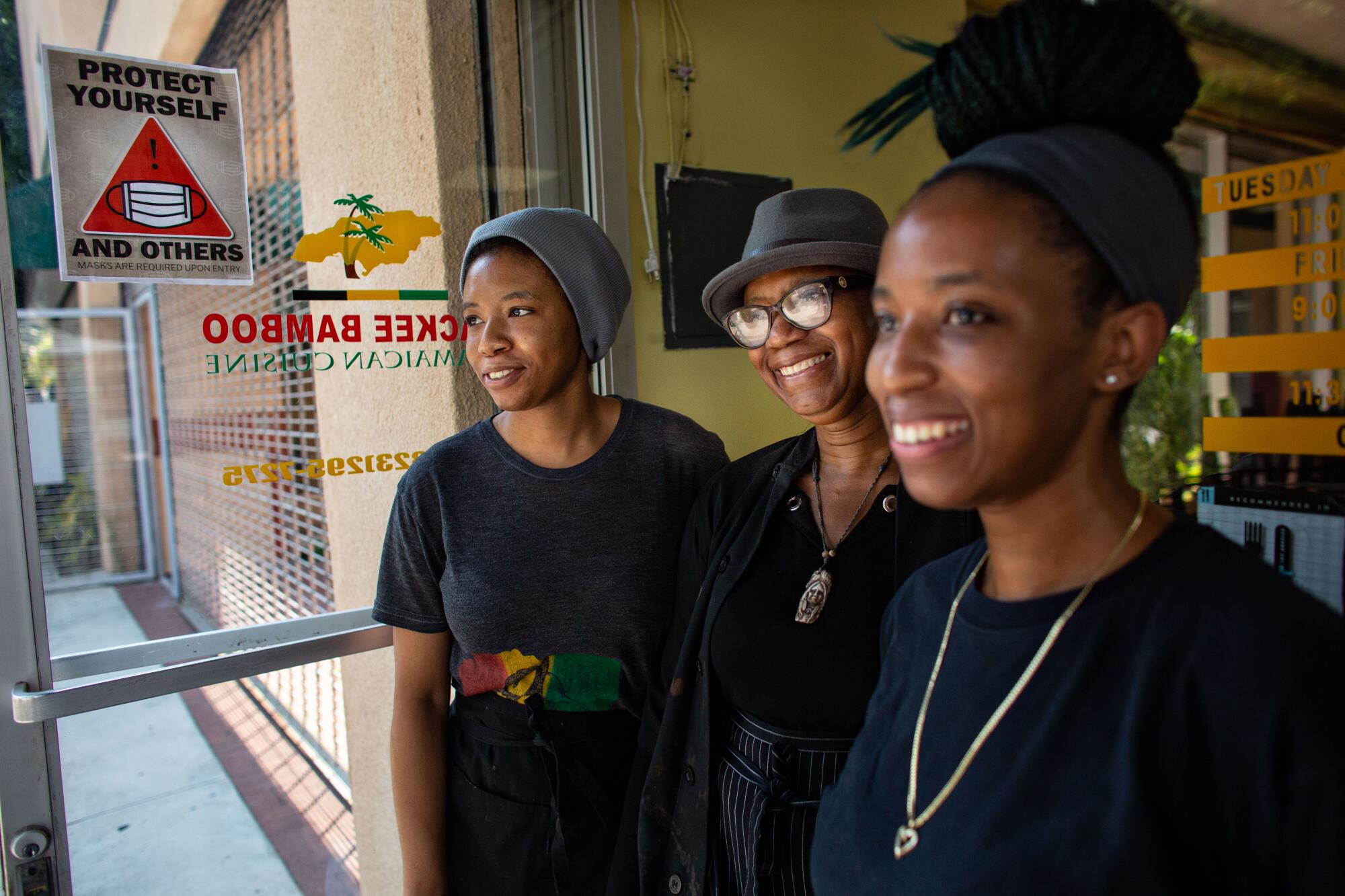 Marlene Sinclair-Beckford, center, opened Ackee Bamboo nearly 15 years ago.