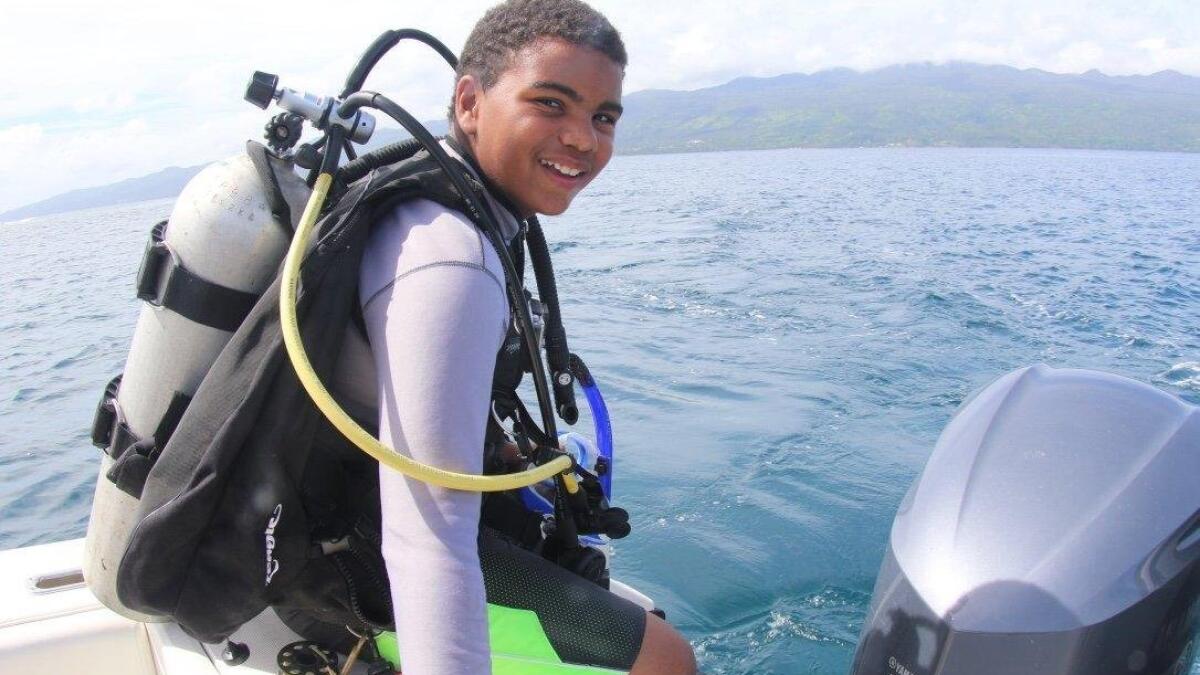 Tiburon middle schooler finds and makes magic underwater as youngest scuba  magician