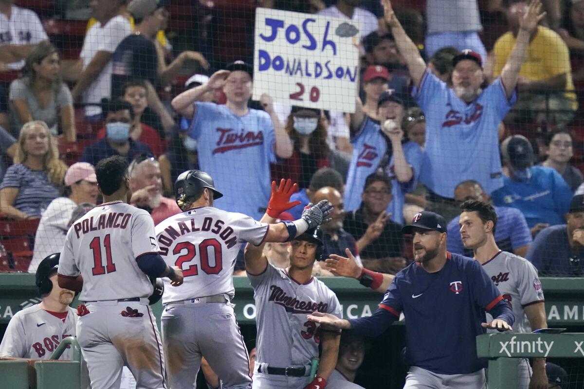 Donaldson, Cave homer in 10th to lead Twins past Red Sox 9-6 - The