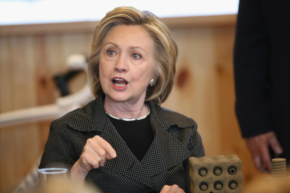 Former Secretary of State Hillary Rodham Clinton hosts a small-business forum Tuesday in Cedar Falls, Iowa. A new poll shows that about three-quarters of Democrats view her favorably.