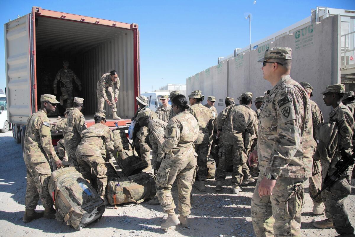 U.S. troops prepare to leave Kandahar airfield at the end of their tour in November.