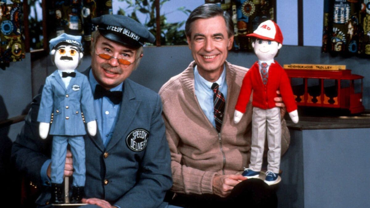 Fred Rogers, right, in 1985 on his PBS show "Mister Rogers' Neighborhood," with David Newell as Mr. McFeely, the "Speedy Delivery" man.