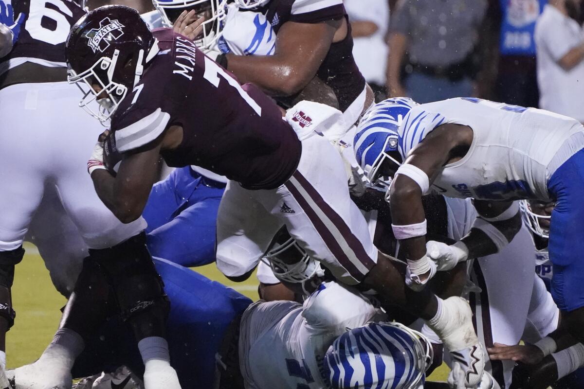 Mississippi State running back Jo'quavious Marks (7) dives across the goal line for a short touchdown run against Memphis during the first half of an NCAA college football game in Starkville, Miss., Saturday, Sept. 3, 2022. (AP Photo/Rogelio V. Solis)