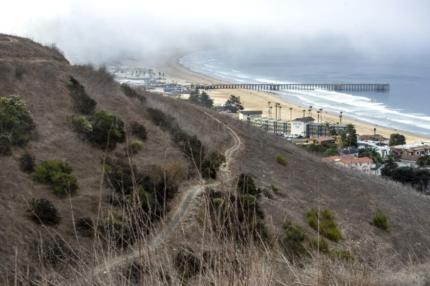 PISMO BEACH, CA - OCTOBER 20: Low clouds drift over Pismo Beach in a view from the Range Road on the Pismo Preserve on Tuesday, Oct. 20, 2020 in Pismo Beach, CA. (Brian van der Brug / Los Angeles Times)