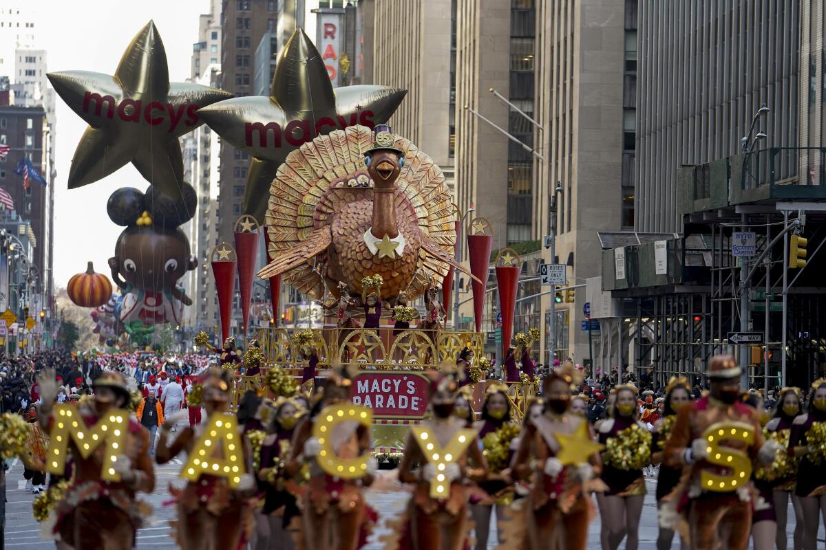 The Tom Turkey float moves down 6th Avenue during the Macy's Thanksgiving Day Parade in New York City.
