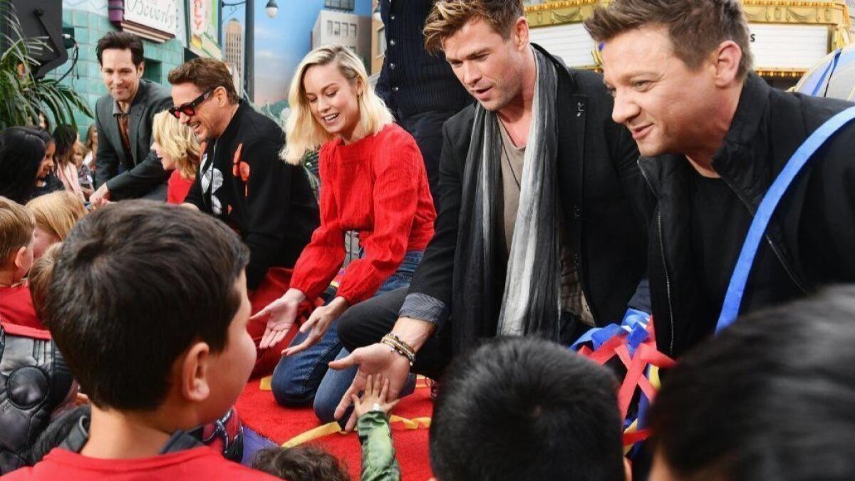 Paul Rudd, from far left, Scarlett Johansson, Robert Downey Jr., Brie Larson, Chris Hemsworth and Jeremy Renner at the charity event Avengers Universe Unites at Disney California Adventure Park in Anaheim.