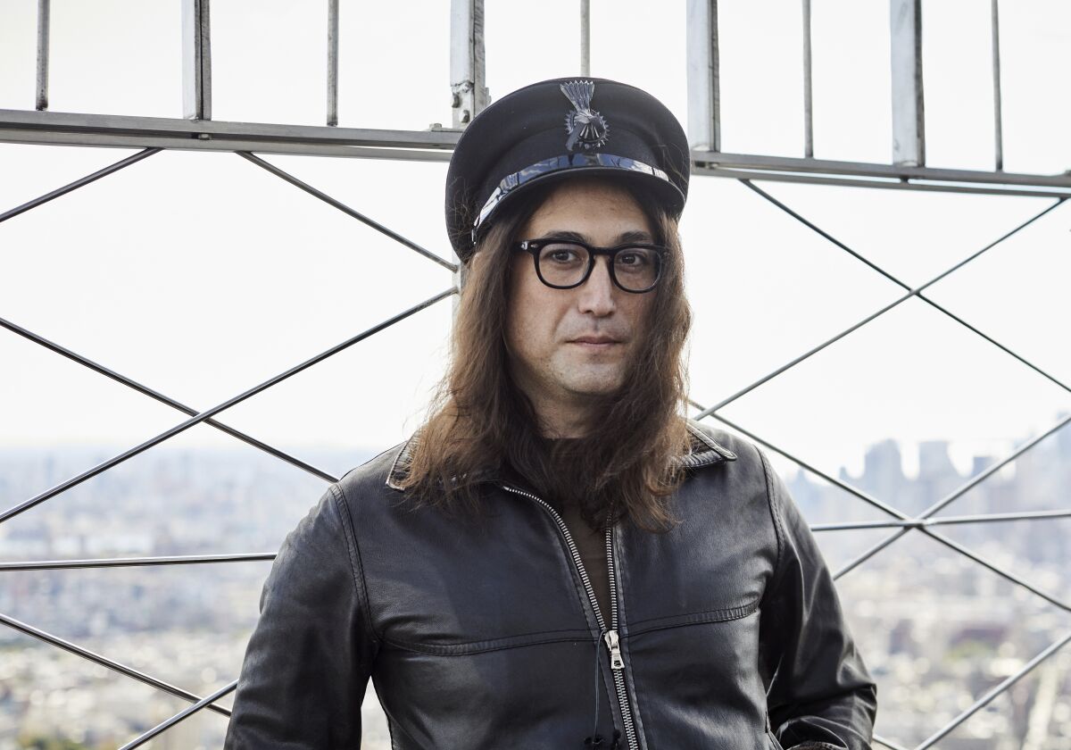 Sean Ono Lennon poses for a portrait on the observation deck of the Empire State building on Thursday Oct. 8, 2020, in New York to promote an album being released of his father's best known songs. On Friday, which would have been John Lennon’s 80th birthday, “GIMME SOME TRUTH. THE ULTIMATE MIXES” will be released. It includes 36 tracks hand-picked by Yoko Ono and Sean Ono Lennon, who serve as executive producer and producer on the project. (Photo by Matt Licari/Invision/AP)