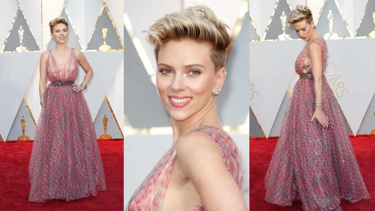 Scarlett Johansson is wearing an Alaia dress with an edgy studded black belt. This look is a bit confusing and feels too casual for the Academy Awards. Therefore, Scarlett earned a timeout on our worst-dressed list.