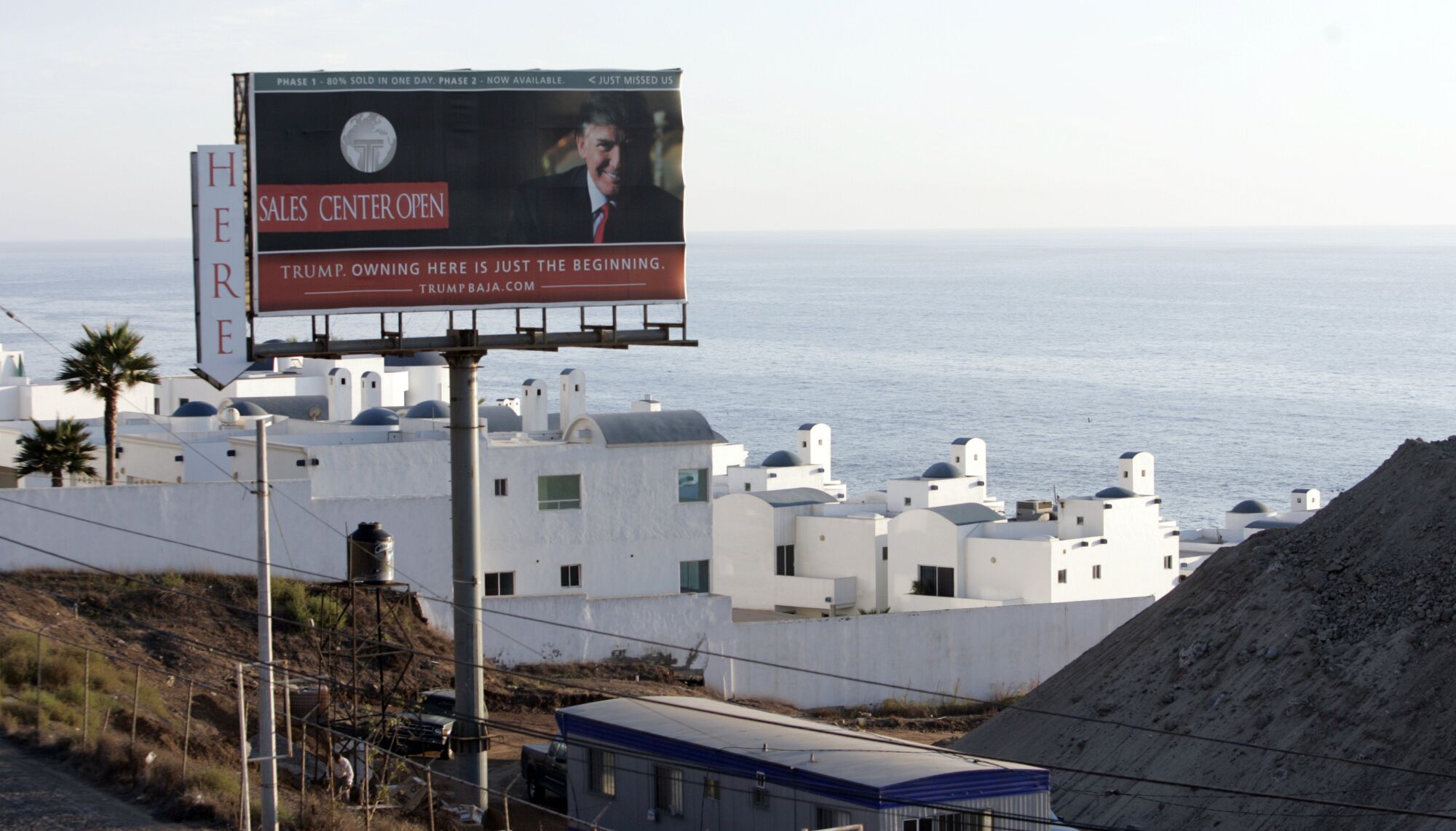 A Trump resort billboard is shown against stretch of Pacific coast between Tijuana's Playas area and Rosarito.