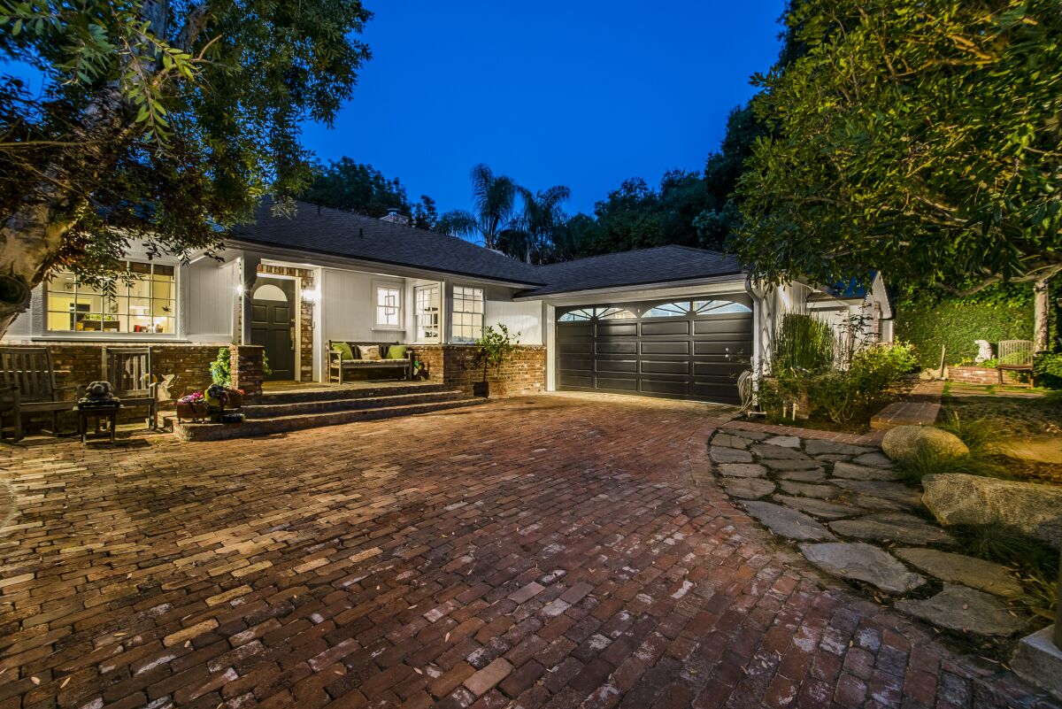 The Studio City home where Ed Asner once lived features three bedrooms and three bathrooms in about 2,800 square feet of living space.