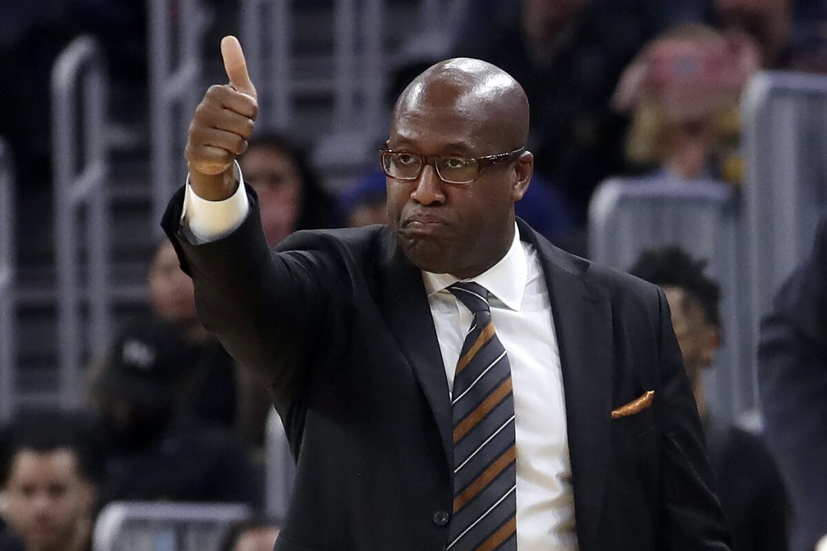 FILE - Golden State Warriors assistant coach Mike Brown gestures during an NBA basketball game against the Portland Trail Blazers in San Francisco, Nov. 4, 2019. The Sacramento Kings have agreed to hire Brown as their new head coach. A person familiar with the decision confirmed on Sunday, May 8, 2022, that Brown will take over the franchise with the longest playoff drought in NBA history. The person spoke on condition of anonymity because the team had not announced the hiring. (AP Photo/Jeff Chiu, File)