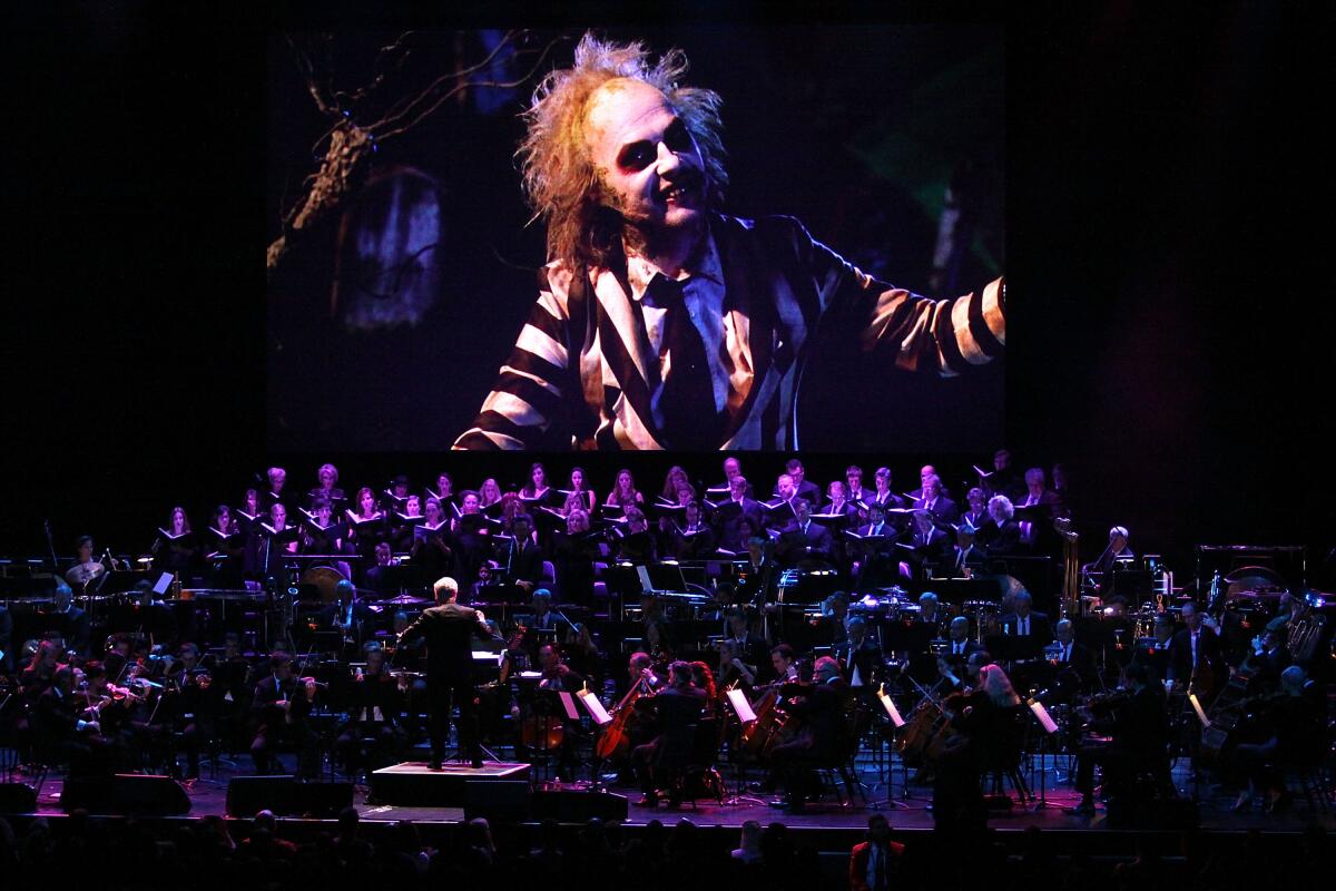 Danny Elfman performs in costume and makeup of Beetlejuice