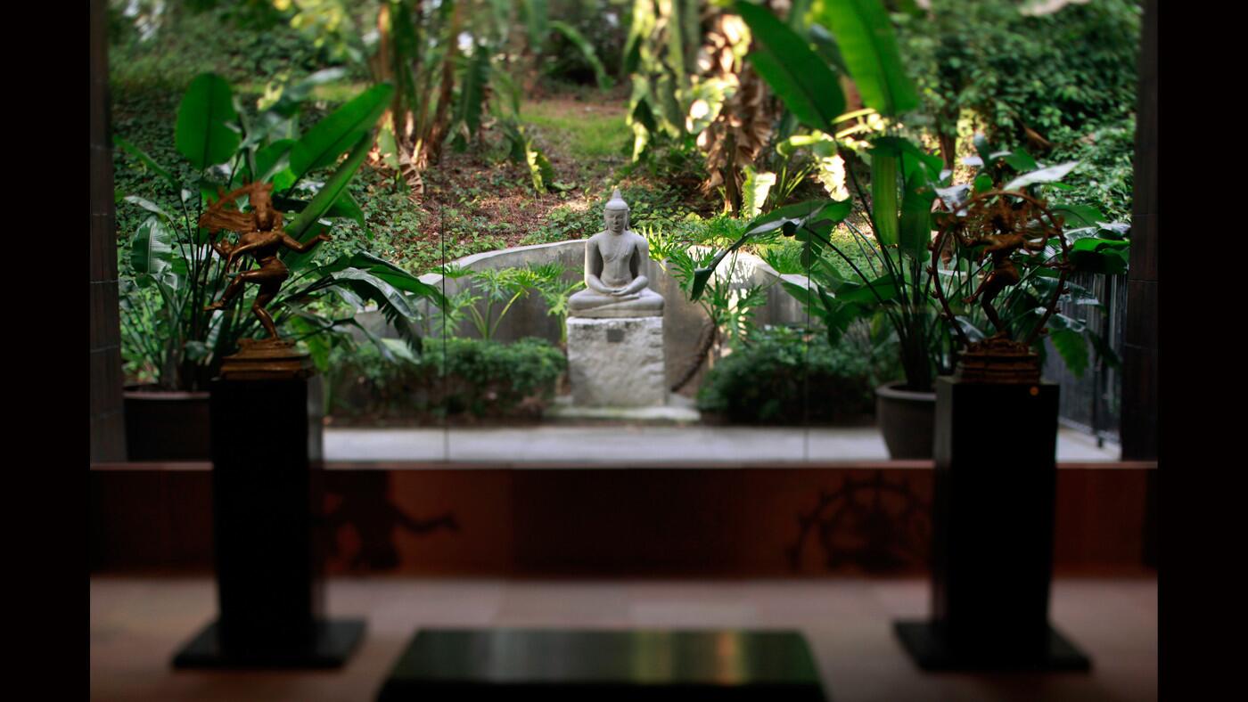The garden can be seen through a section of the South and Southeast Asian collection housed on the lower level of the Norton Simon Museum.