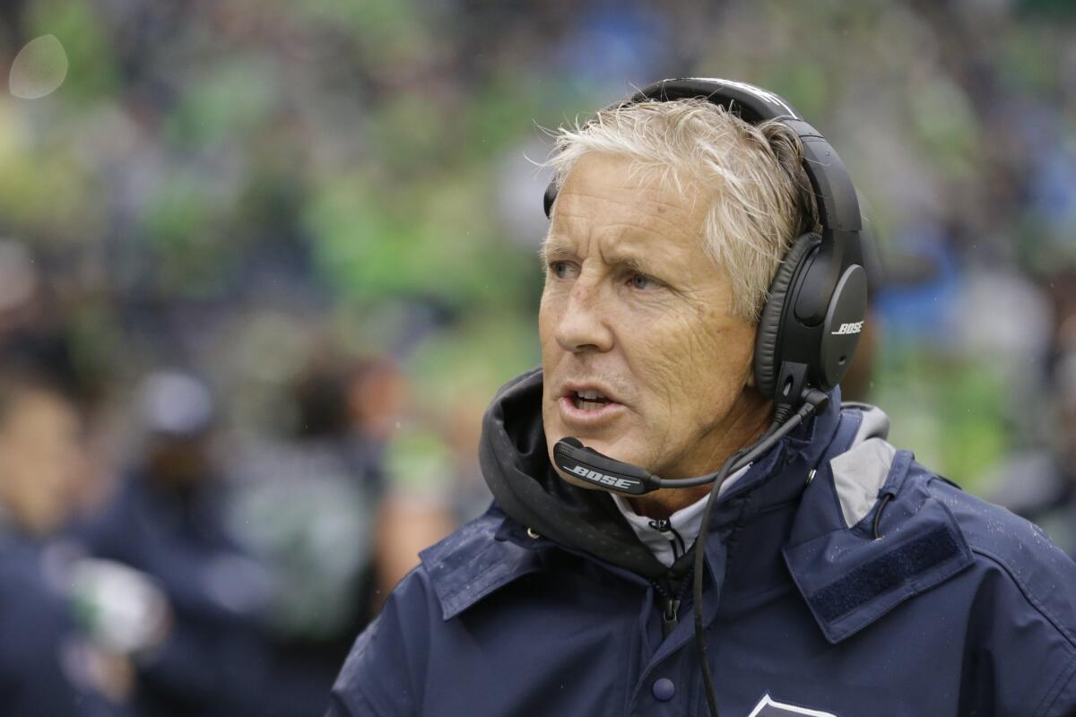 Seattle Seahawks Coach Pete Carroll walks the sideline Friday before an exhibition game against Denver.