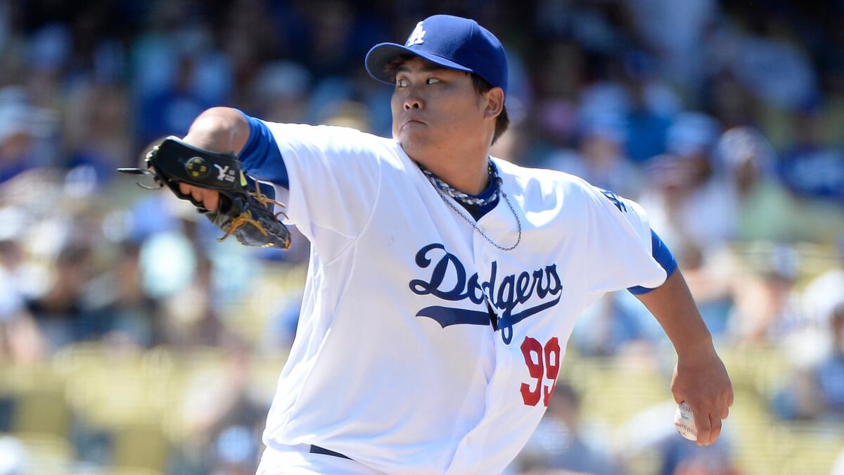 Dodgers starter Hyun-Jin Ryu delivers a pitch during the team's 1-0 win over the San Diego Padres at Dodger Stadium on Sunday.