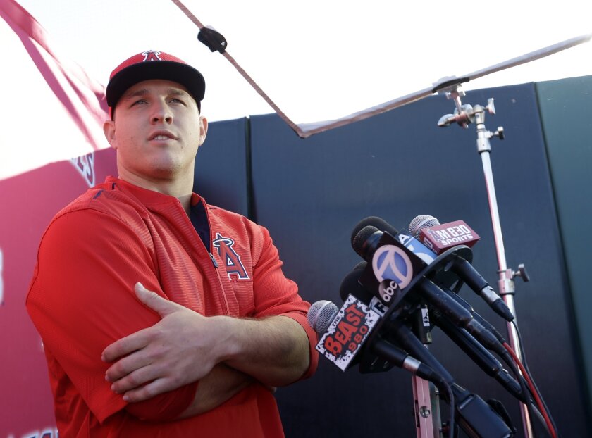 Angels star Mike Trout answers questions before a spring training workout Wednesday in Tempe, Ariz.