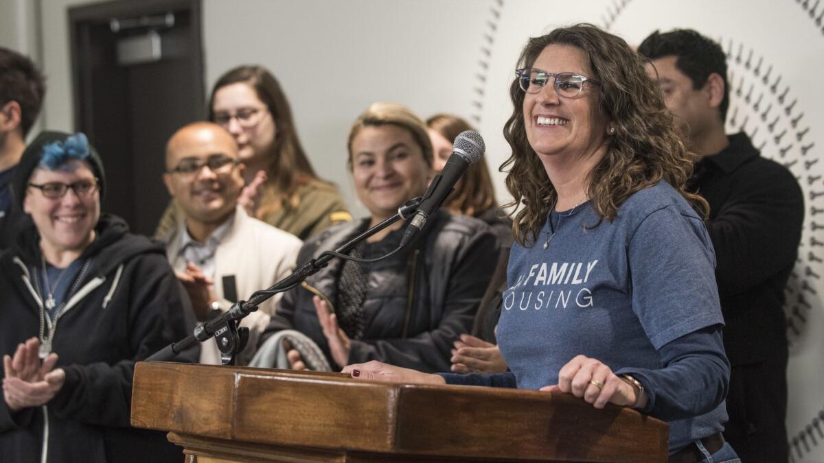 Stephanie Klasky-Gamer, president and CEO of LA Family Housing, addresses people gathered before the three-day Greater Los Angeles Homeless Count at the Fiesta Apartments in North Hollywood.