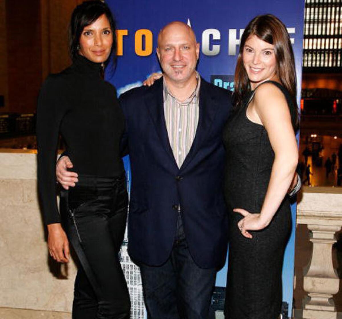 From left, "Top Chef" host Padma Lakshmi, head judge Tom Colicchio and judge Gail Simmons.