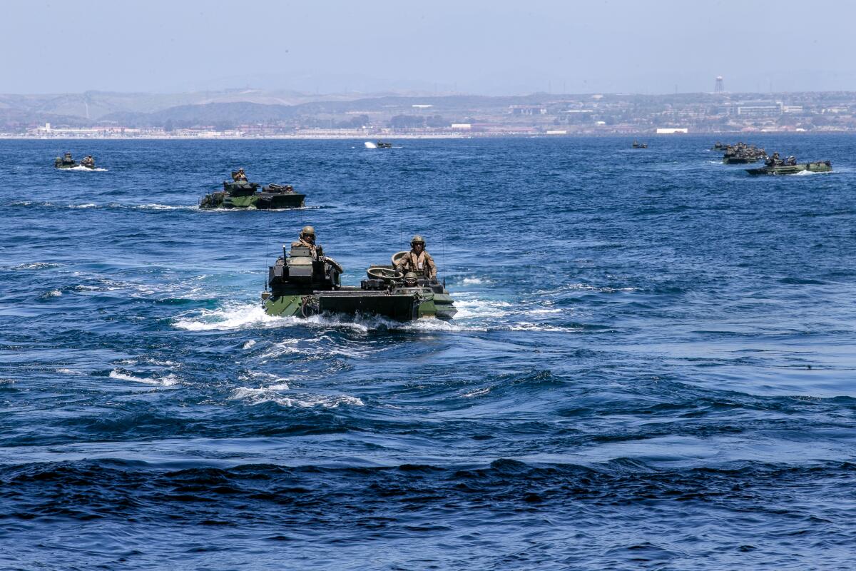 U.S. Marines operate AAV-P7/A1 assault amphibious vehicles 
