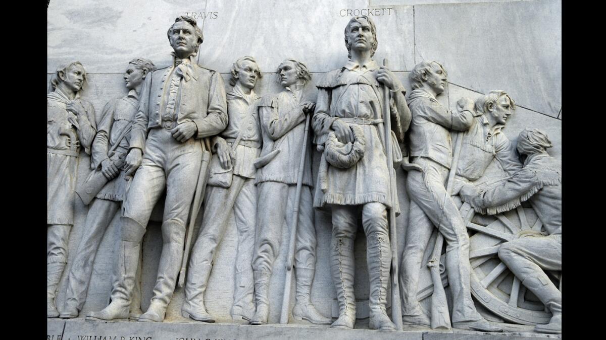 "The Alamo Cenotaph," a.k.a. "The Spirit of Sacrifice" monument, in downtown San Antonio commemorates the famous battle fought nearby on March 6, 1836. It includes images of William B. Travis and Davy Crockett.