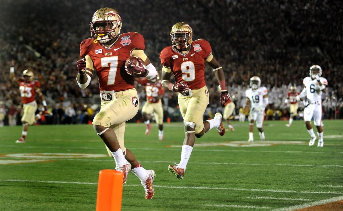 Florida State receiver Kermit Whitfield nears the goal line to complete a 100-yard kickoff return with 4:31 left in the fourth quarter to give the Seminoles a 27-24 lead in the BCS title game.