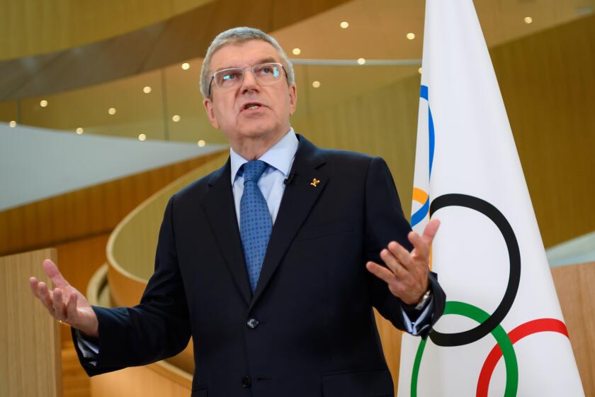 International Olympic Committee (IOC) President Thomas Bach delivers a statement on the COVID-19 situation during a meeting of the executive board at the IOC headquarters in Lausanne on March 3, 2020. - The COVID-19 which has already killed more than 3000 people in the World will be at the center of a meeting of the International Olympic Committee (IOC) on March 3 and 4, 2020 in Lausanne less than five months before the opening ceremony of the Olympics in Tokyo. (Photo by Fabrice COFFRINI / AFP) (Photo by FABRICE COFFRINI/AFP via Getty Images)